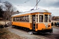 Vintage orange trolley on tracks