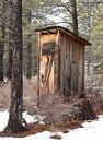 Vintage Outhouse in Forest Snow Royalty Free Stock Photo