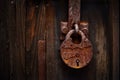 Vintage padlock close-up on wooden door Royalty Free Stock Photo