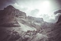 Vintage panorama of giant boulders expanse with Giussani Mountain Hut at the foot of Tofana summit