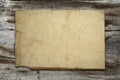 Vintage paper on wood texture Royalty Free Stock Photo