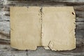 Vintage paper on wood texture Royalty Free Stock Photo