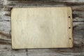 Vintage paper on wood texture Royalty Free Stock Photo