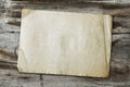 Vintage paper on wood texture Royalty Free Stock Photo