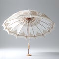 a vintage parasol umbrella showcased on a clean white background. Royalty Free Stock Photo