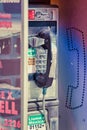 A vintage metal payphone in the United States Royalty Free Stock Photo