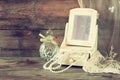 Vintage pearls , antique wooden jewelry box with mirror and perfume bottle Royalty Free Stock Photo
