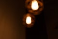 Vintage pendant light bulbs Edison on a dark background. ÃÂ¡oncept of creativity. Old vintage light bulb. Brick wall background Royalty Free Stock Photo