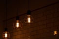 Vintage pendant light bulbs Edison on a dark background. ÃÂ¡oncept of creativity. Old vintage light bulb Royalty Free Stock Photo