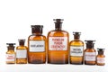 Vintage pharmacy bottles on white background Royalty Free Stock Photo