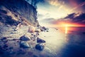 Vintage photo of beautiful rocky sea shore at sunrise Royalty Free Stock Photo