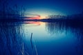 Vintage photo of beautiful sunset over calm lake Royalty Free Stock Photo