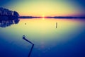 Vintage photo of beautiful sunset over calm lake Royalty Free Stock Photo