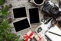 Vintage photo camera on christmas wooden background with blank photo frame Royalty Free Stock Photo