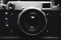 Vintage photo camera in darkness background, close up Royalty Free Stock Photo