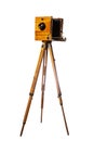 Vintage wooden camera on tripod isolated on white background Royalty Free Stock Photo