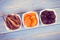 Vintage photo, Dried fruits in white bowl on wooden boards, healthy nutrition