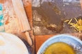 Vintage photo of flour, nuts and bake item on the wooden working desk of dirty top. Composition of bakery products for Royalty Free Stock Photo