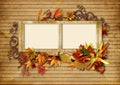 Vintage photo frame with autumn leaves and pencils
