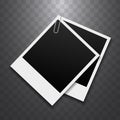 Vintage photo frame mockup secured with a paper clip Royalty Free Stock Photo