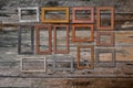 Vintage photo frames on wood wall background Royalty Free Stock Photo