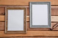 Vintage photo frames on wooden background with space for text and various photos