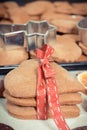 Vintage photo, Fresh baked gingerbread for Christmas time and accessories with ingredients for baking Royalty Free Stock Photo