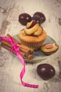 Vintage Photo, Fresh Baked Muffins With Plums And Cinnamon Sticks On Old Wooden Background, Delicious Dessert