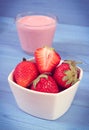 Vintage photo, Fresh strawberries and delicious milkshake on boards, healthy dessert