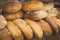 Vintage photo, Freshly baked traditional loaves of rye bread on stall