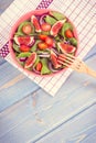 Vintage photo, Fruit and vegetable salad with wooden fork, concept of healthy lifestyle and nutrition Royalty Free Stock Photo