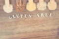 Vintage photo, Gluten free inscription with groats, amaranth, rice and quinoa seeds, copy space for text