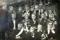 Vintage photo of groom, bride and guests. Ukrainian wedding circa 1960