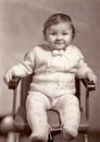 Vintage photo of happy smiling little baby girl Royalty Free Stock Photo