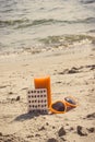 Vintage photo, Medical pills, carrot juice and sunglasses at beach, vitamin A and beautiful, lasting tan Royalty Free Stock Photo