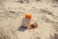 Vintage photo, Medical pills, carrot juice and sunglasses on sand at beach, vitamin A and beautiful, lasting tan Royalty Free Stock Photo