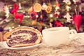 Vintage photo, Poppy seeds cake, coffee or tea and christmas tree with decoration and hay, Christmas time concept Royalty Free Stock Photo