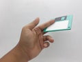 Vintage Photo Realistic Small Electronic Magnetic Floppy Disk for Old Computer Data Storage in White Background