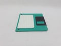 Vintage Photo Realistic Small Electronic Magnetic Floppy Disk for Old Computer Data Storage in White Isolated Background