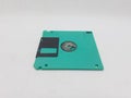 Vintage Photo Realistic Small Electronic Magnetic Floppy Disk for Old Computer Data Storage in White Isolated Background