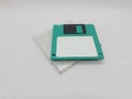 Vintage Photo Realistic Small Electronic Magnetic Floppy Disk for Old Computer Data Storage in White Isolated Background