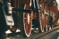 A vintage photo of the red wheels of an old 20th-century locomotive Royalty Free Stock Photo