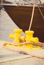 Vintage photo, Rope and mooring bollard in port, parts of seaport and yacht Royalty Free Stock Photo