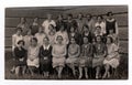 Vintage photo shows a group of girls (classmates) in front of school on June 27, 1927 in Hodonin Royalty Free Stock Photo