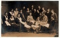 Vintage photo shows young girls schoolmates, students . Black white antique photography.