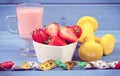 Vintage photo, strawberries, milkshake, dumbbells and centimeter, healthy and sporty lifestyle concept