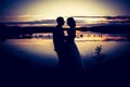 Vintage photo of wedding couple silhouettes in outdoor Royalty Free Stock Photo