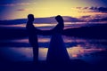 Vintage photo of wedding couple silhouettes in outdoor Royalty Free Stock Photo