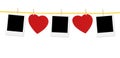 Vintage photos frame on the clothesline with hearts over white Royalty Free Stock Photo