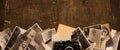 Vintage photos on the old background, with a camera zenith Royalty Free Stock Photo